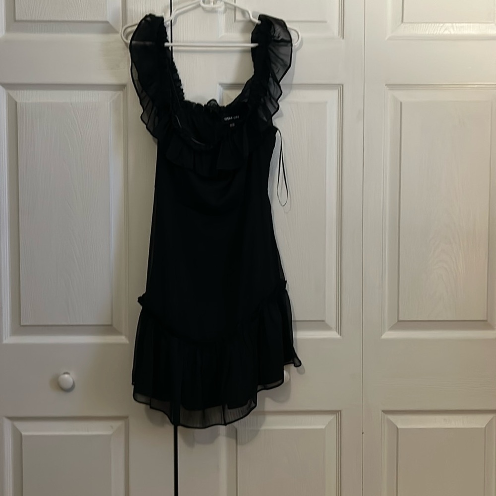 Black flowey wedding guest dress. Can be worn up or off the shoulder.